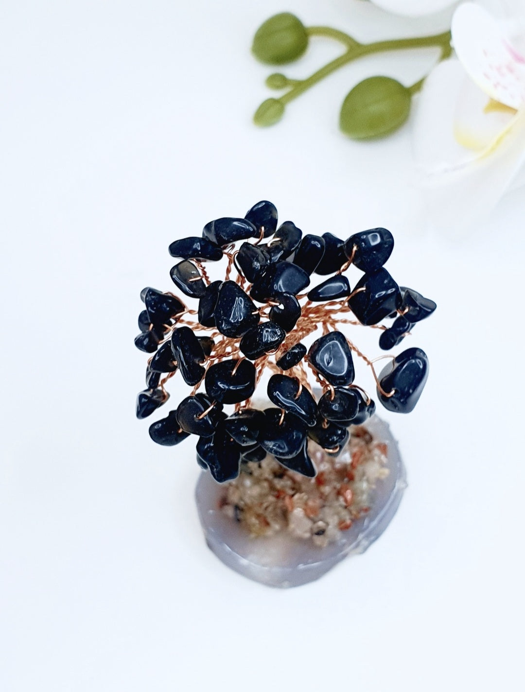 Tree of energy made from natural stone obsidian
