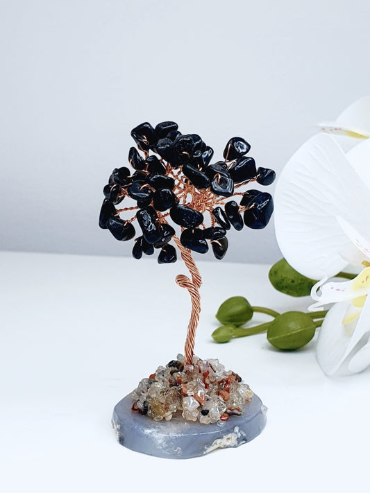 Tree of energy made from natural stone obsidian